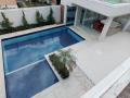 Quintas do Rio - Mansão 5 suites com closets possui quarto embaixo, piscina sauna Hidro, area gourmet